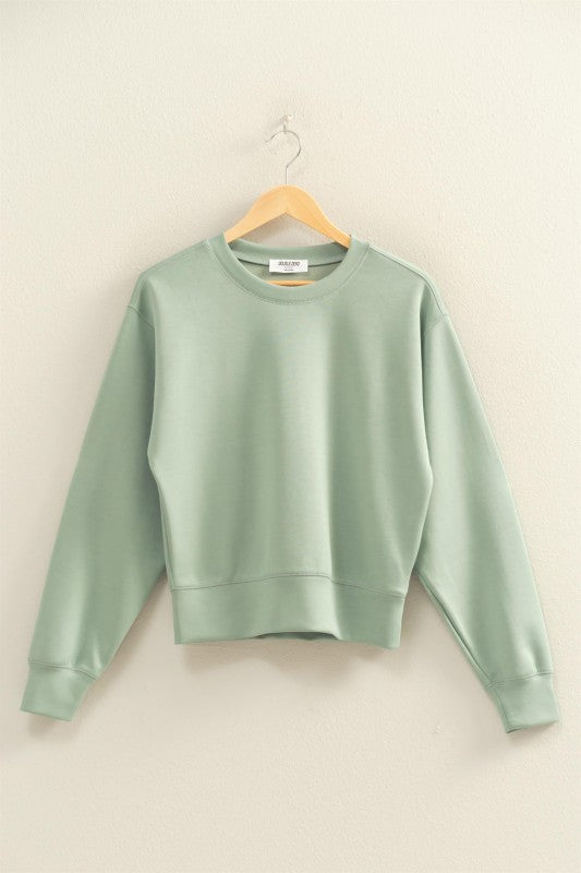 sage green sweatshirt