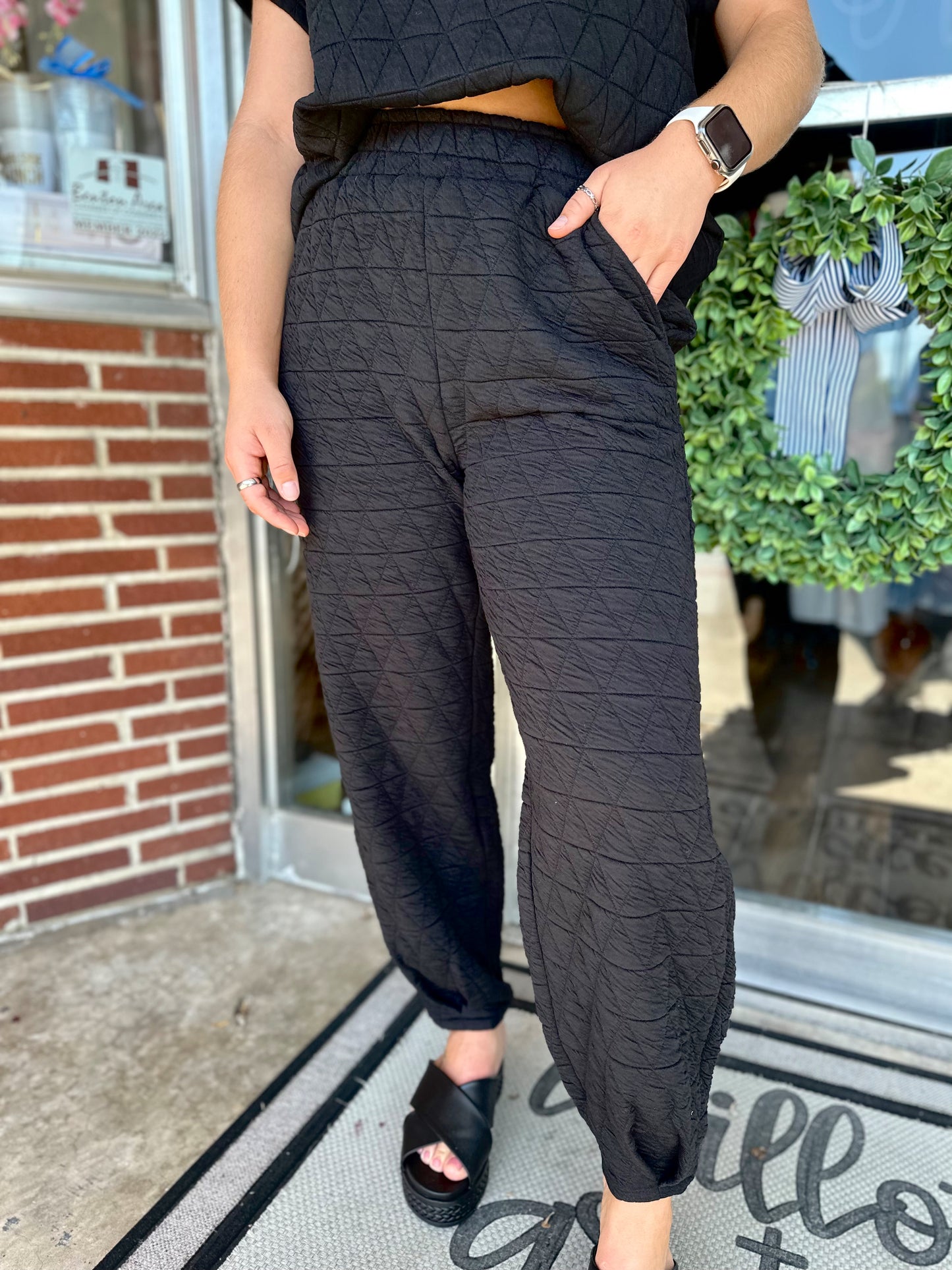 Black quilted joggers