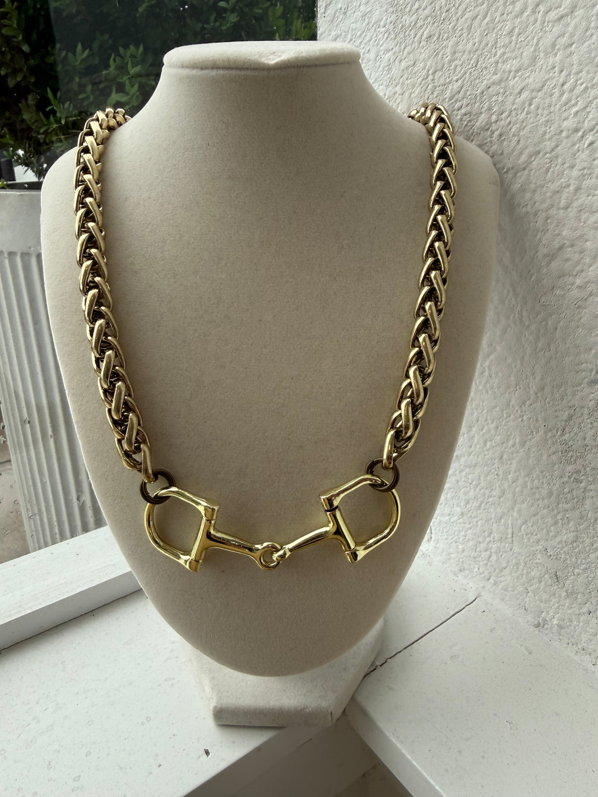 Gold double Snaffle bit on chain necklace