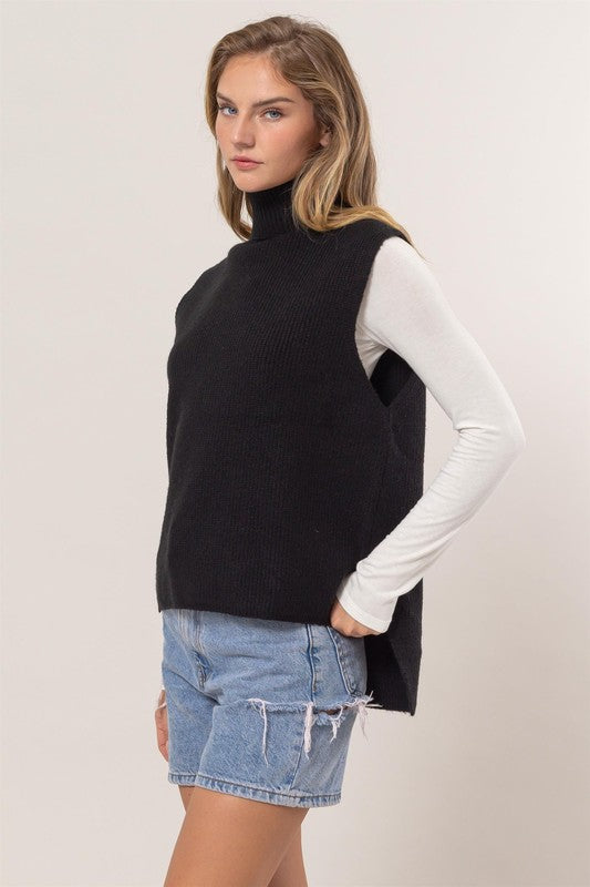 Black turtleneck sweater vest