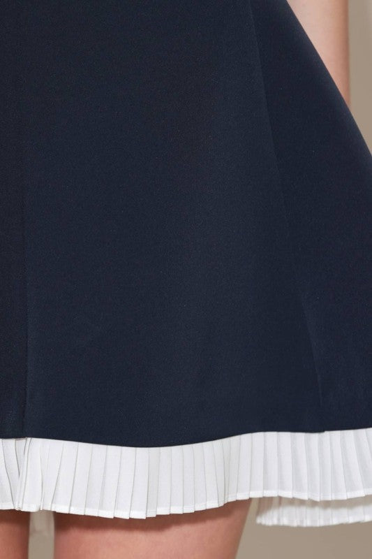 navy/white pleated hem mini dress
