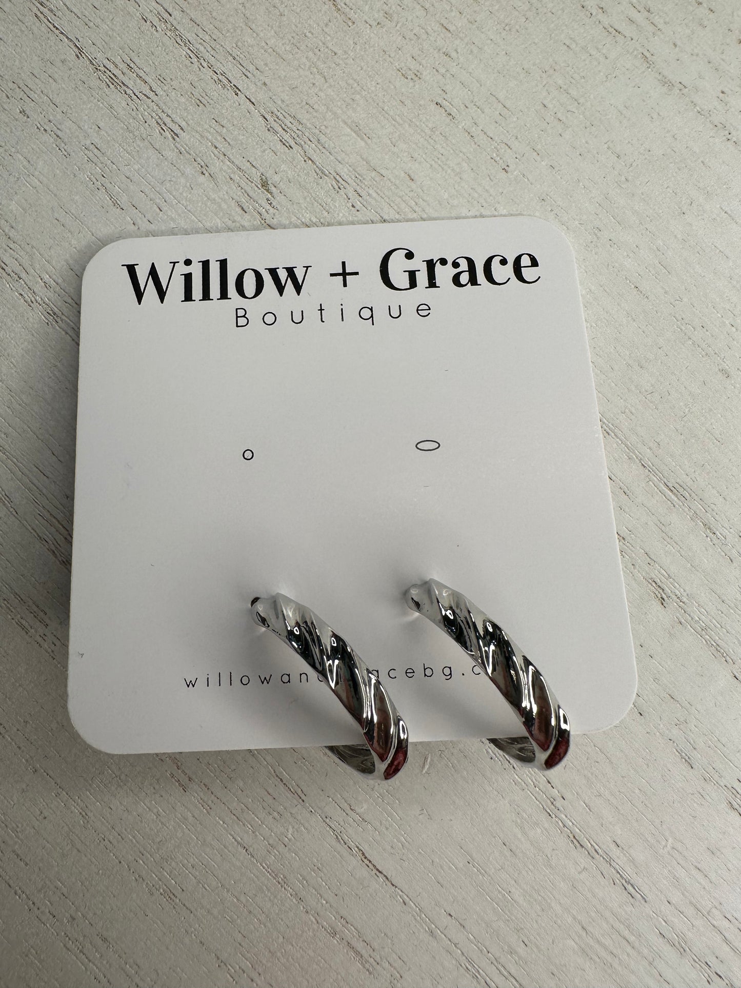 Silver hoop earring