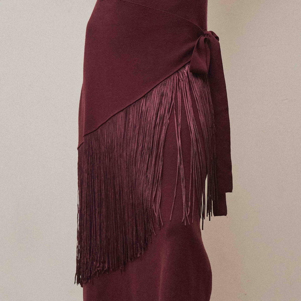 Fringe faux wrap dress