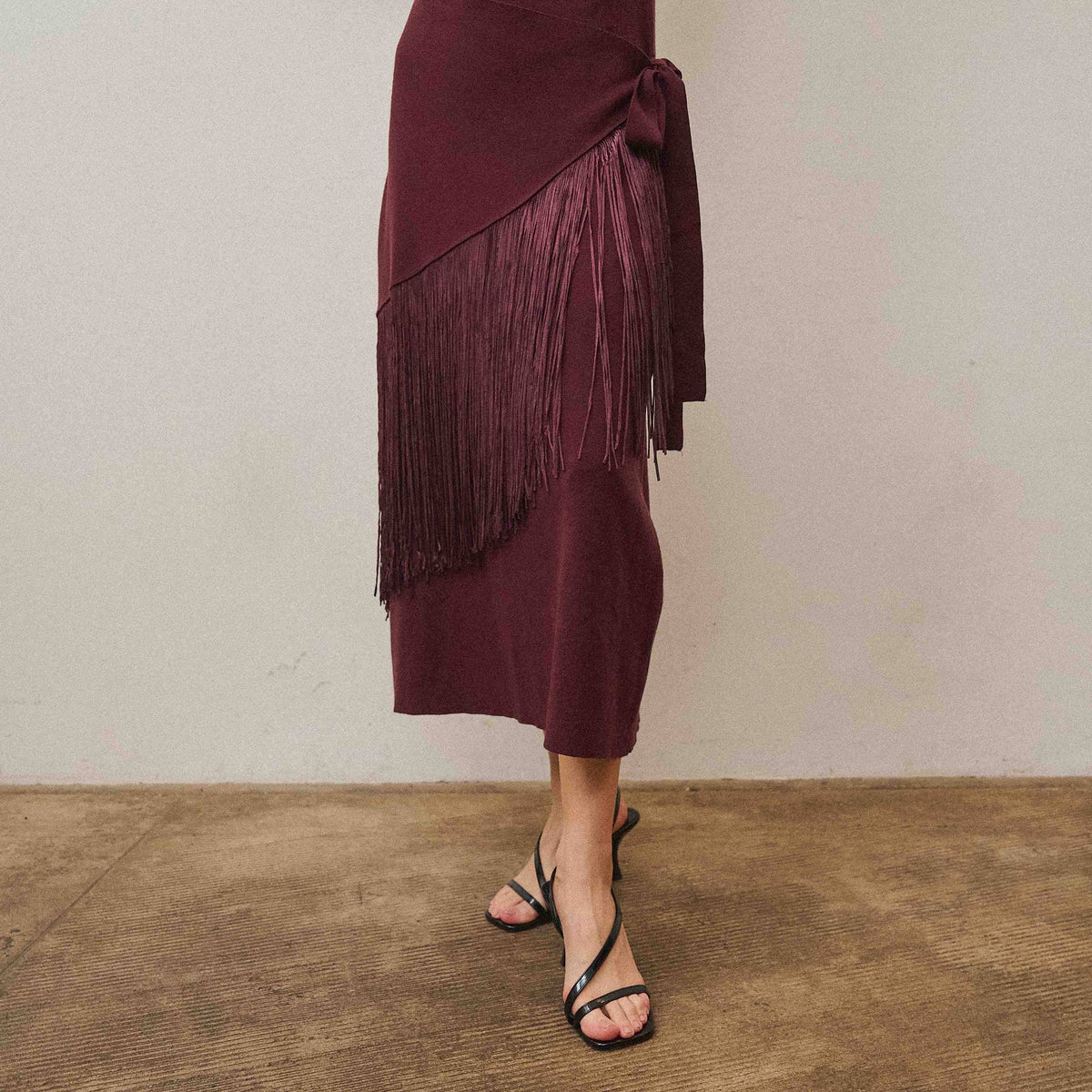 Fringe faux wrap dress