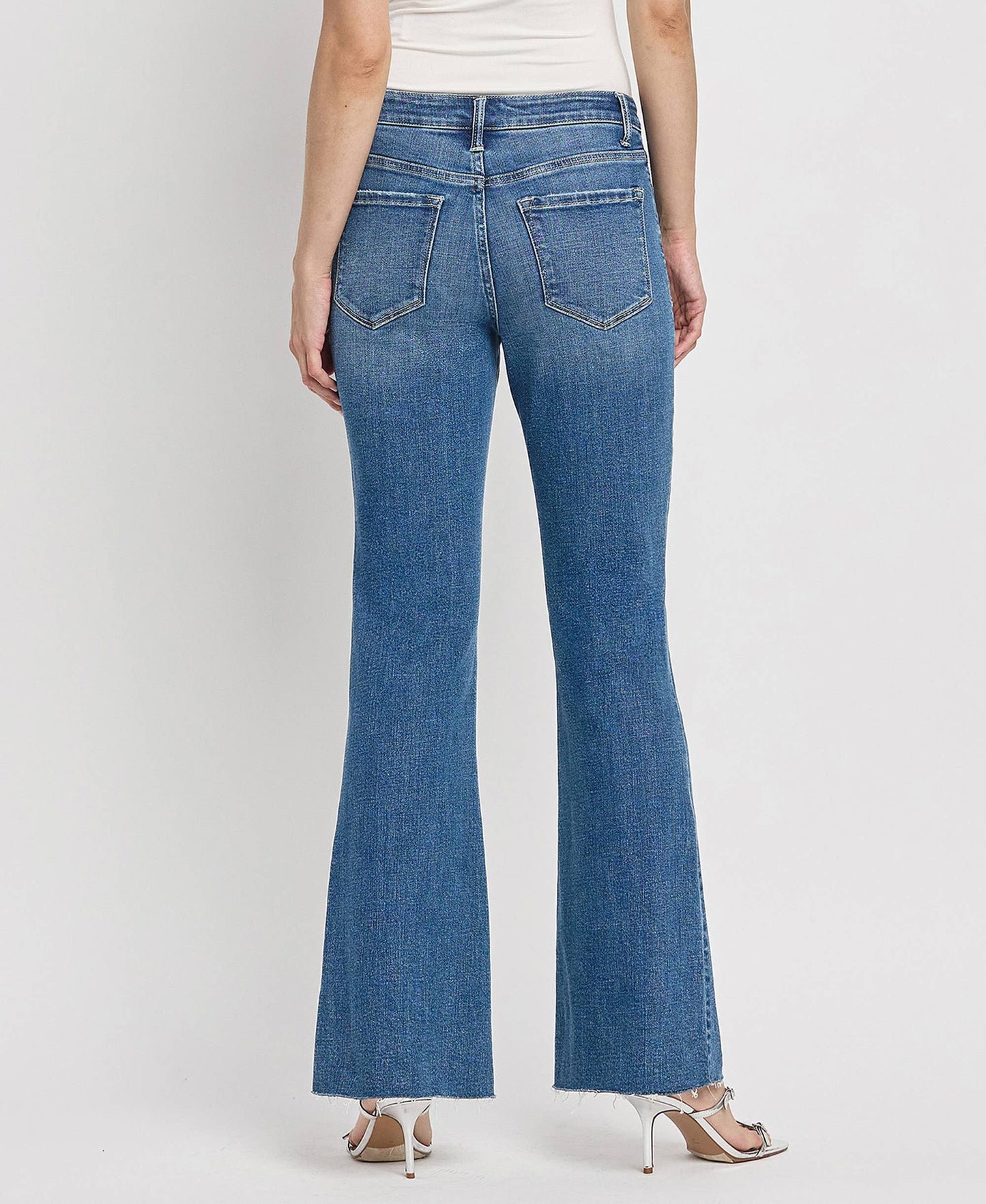 HIGH RISE RAW HEM RELAXED FLARE JEANS