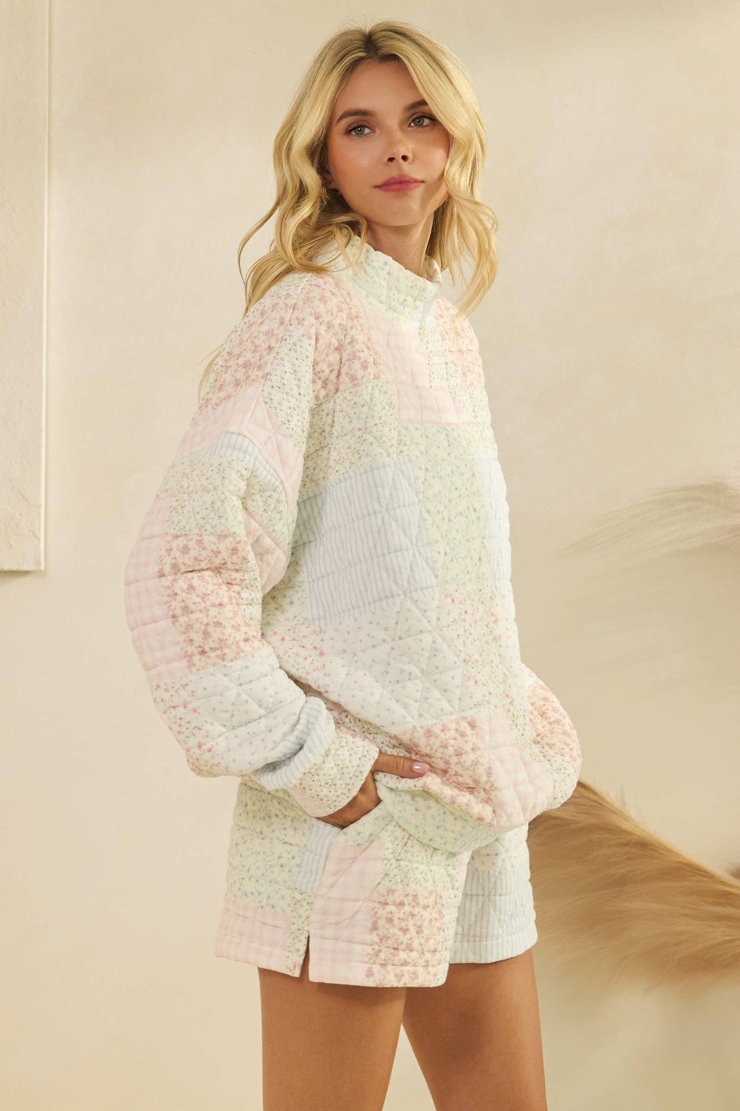 Floral textured mock neck sweatshirt