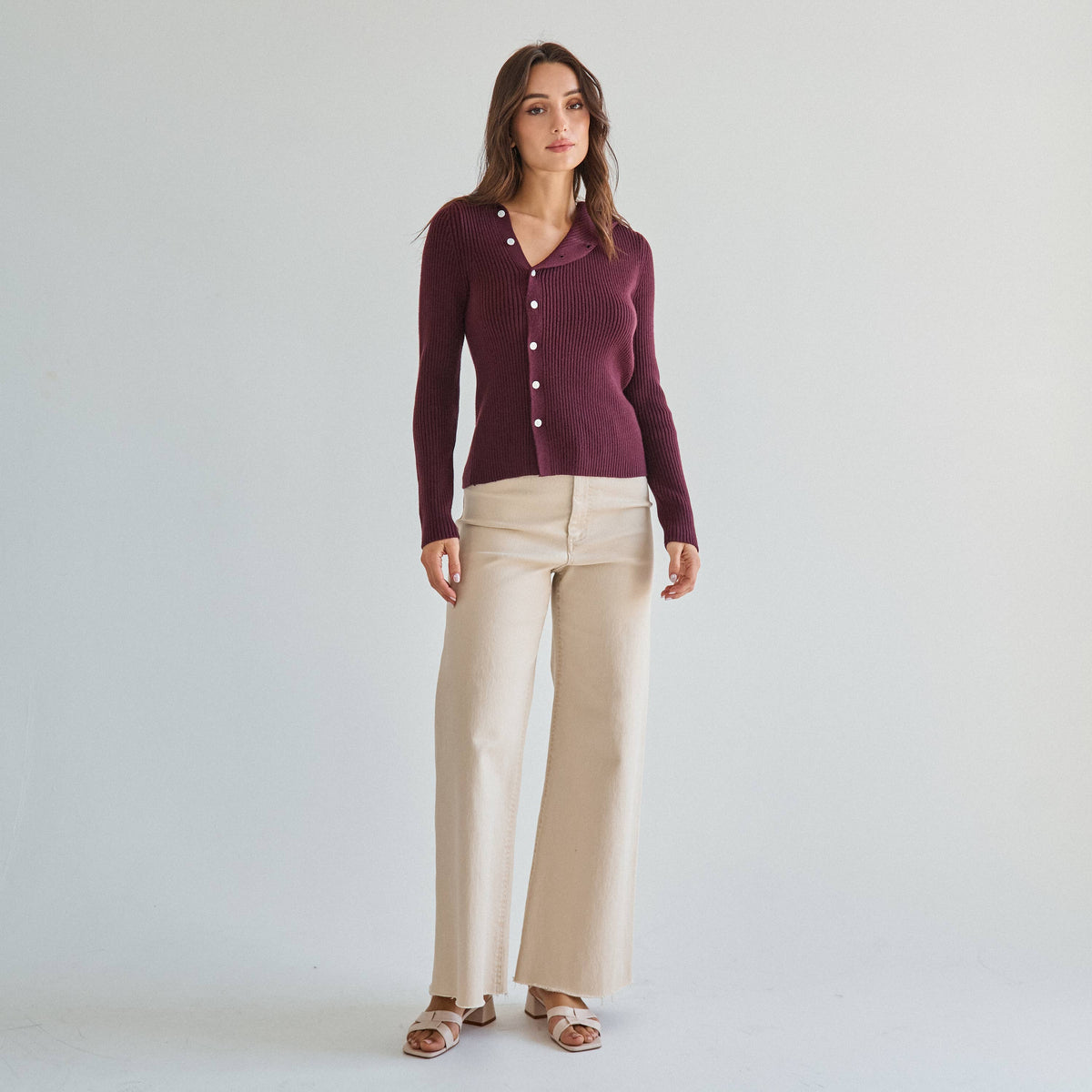 Asymmetrical button sweater