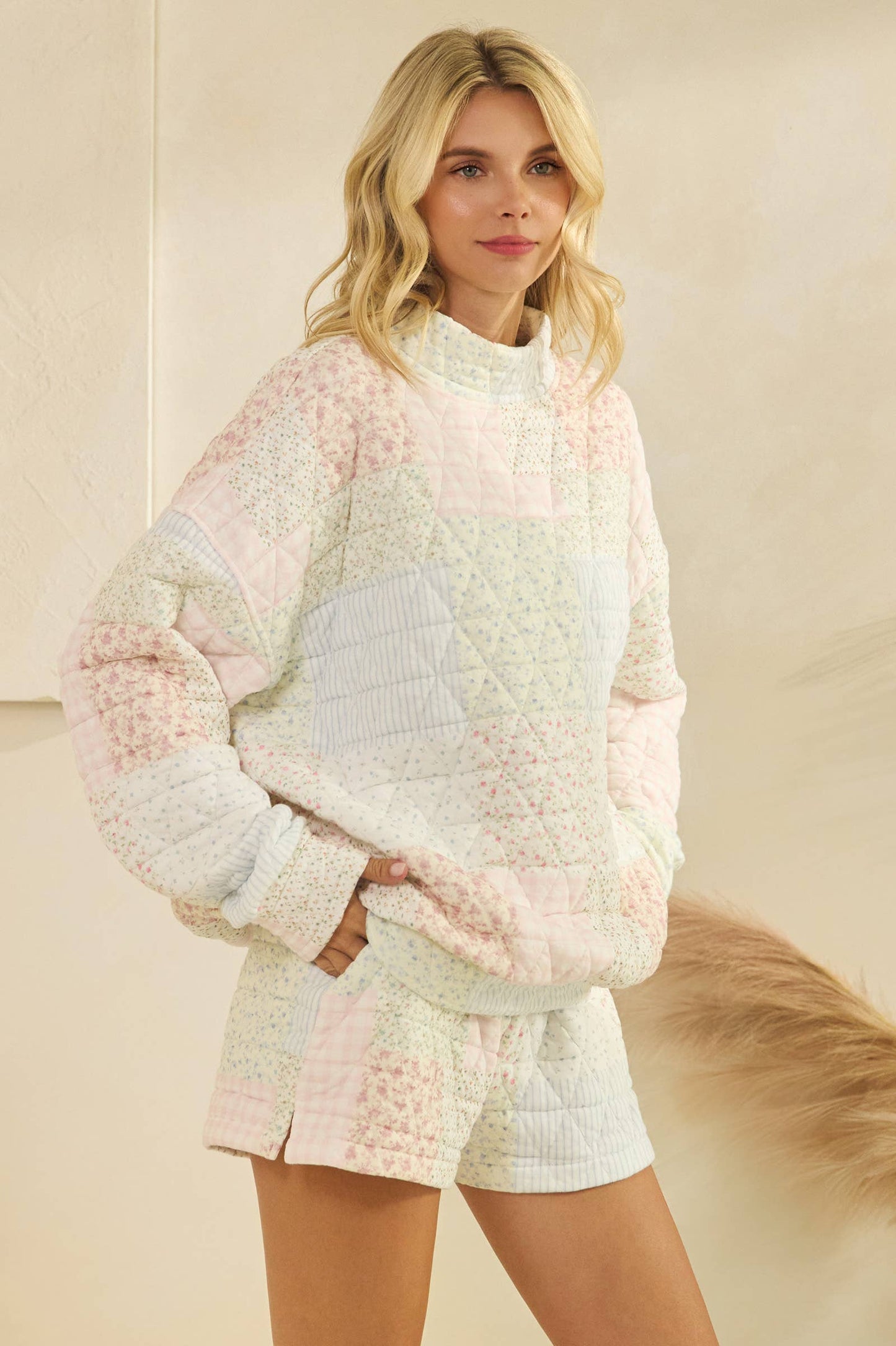 Floral textured mock neck sweatshirt