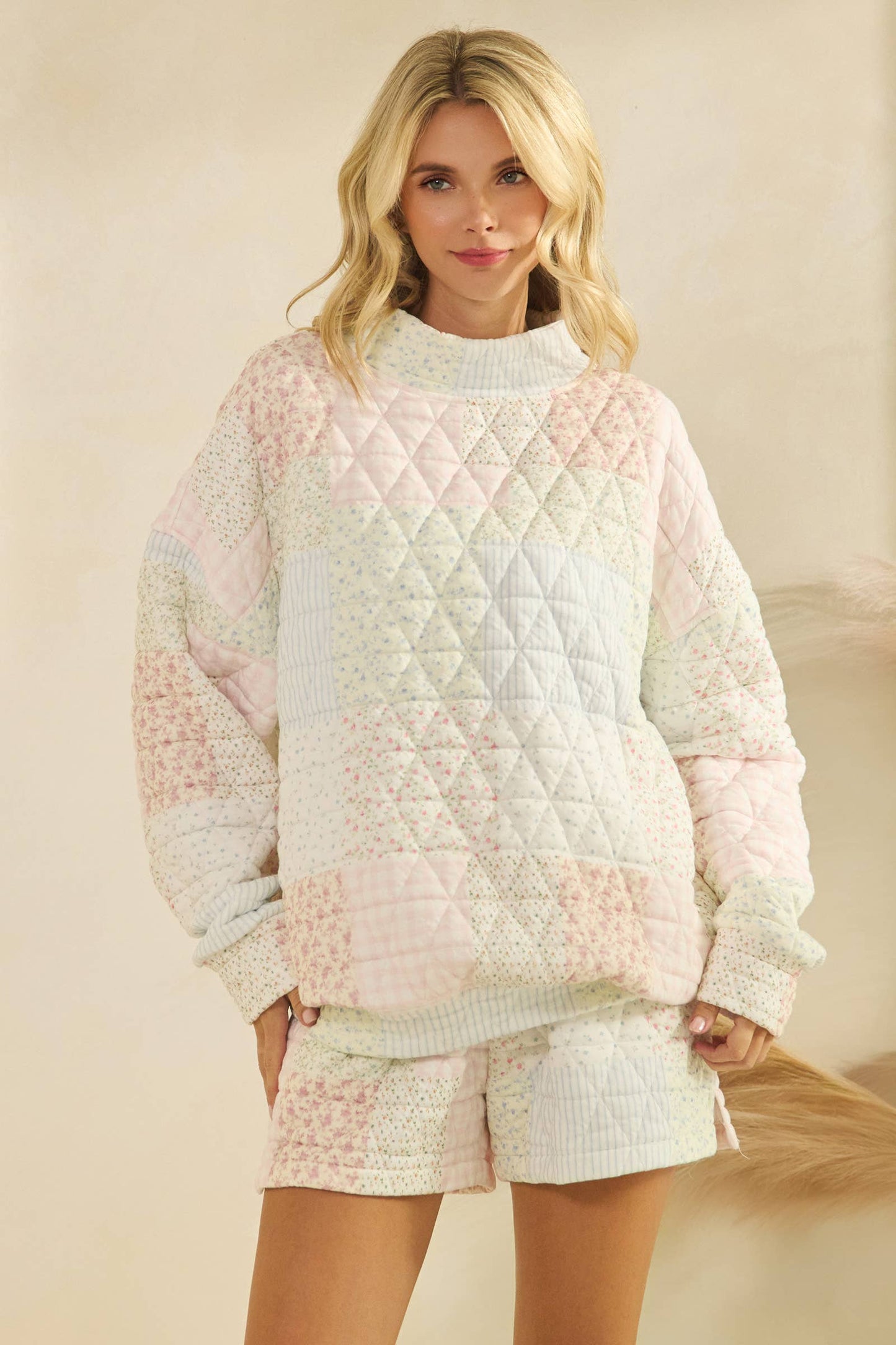 Floral textured mock neck sweatshirt