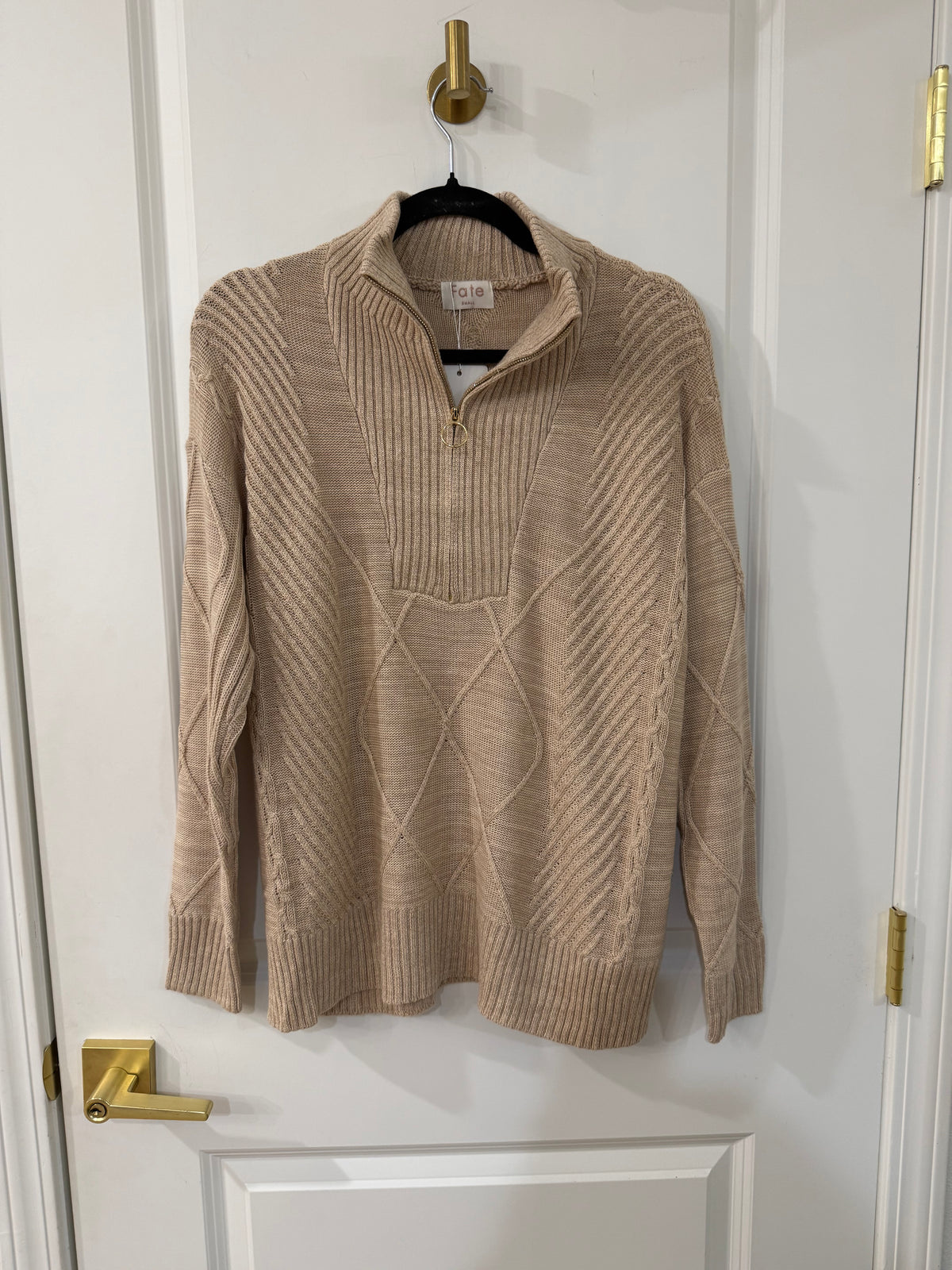 Beige ribbed knit zip collar