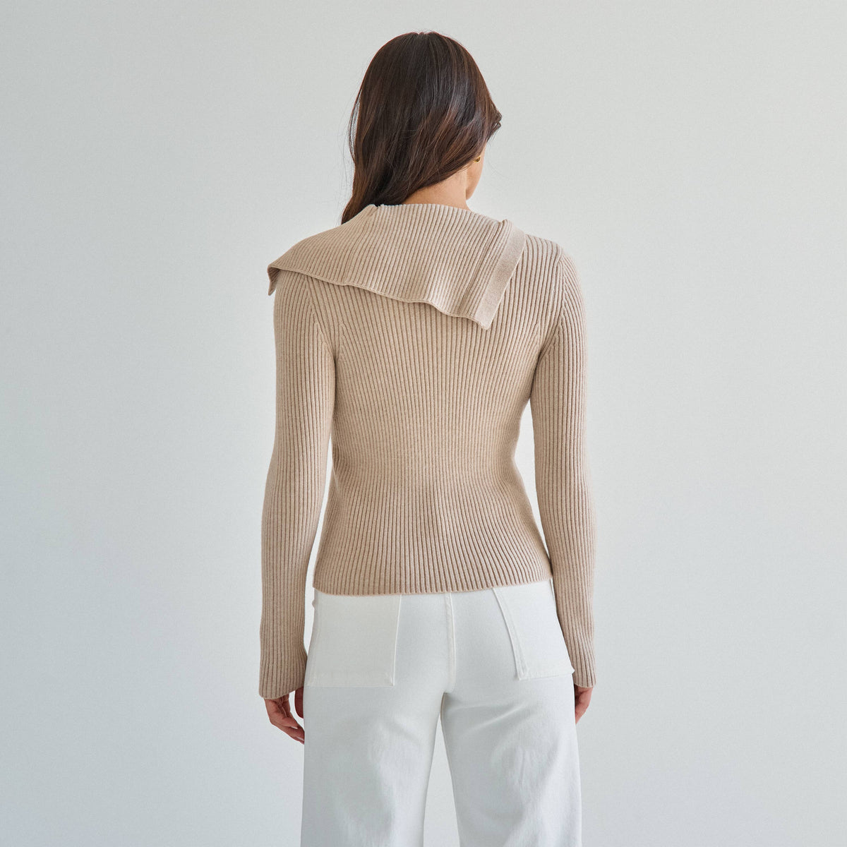 Asymmetrical button sweater
