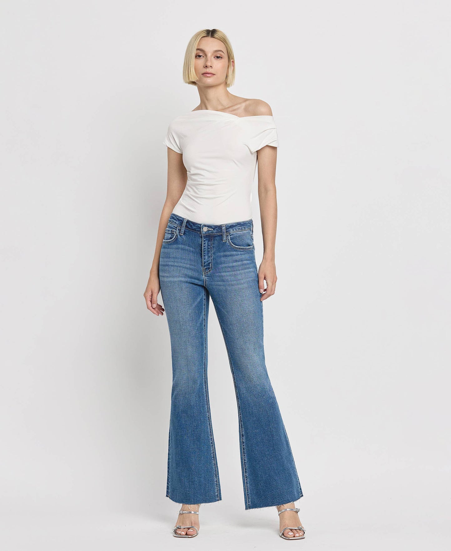 HIGH RISE RAW HEM RELAXED FLARE JEANS