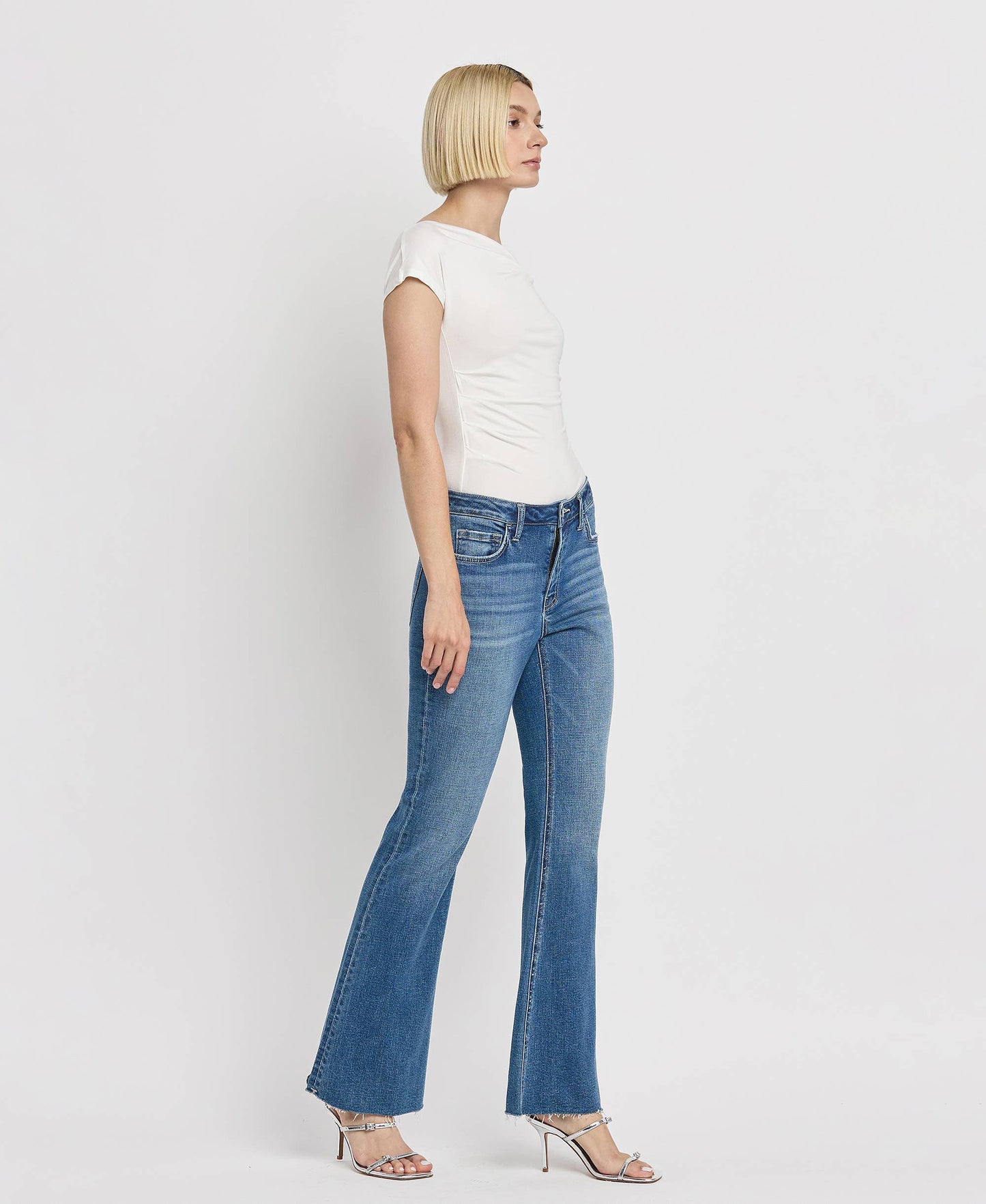 HIGH RISE RAW HEM RELAXED FLARE JEANS