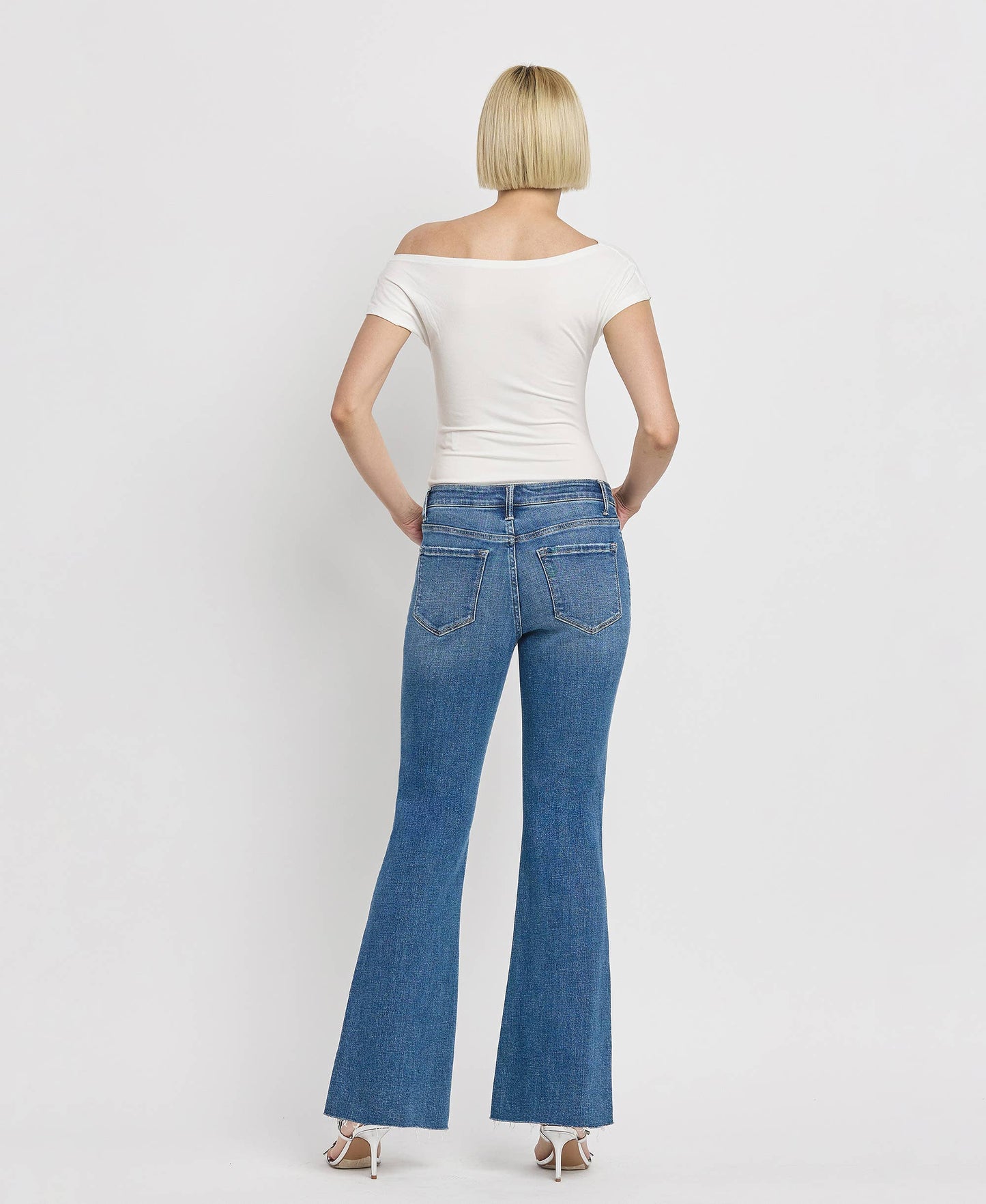 HIGH RISE RAW HEM RELAXED FLARE JEANS