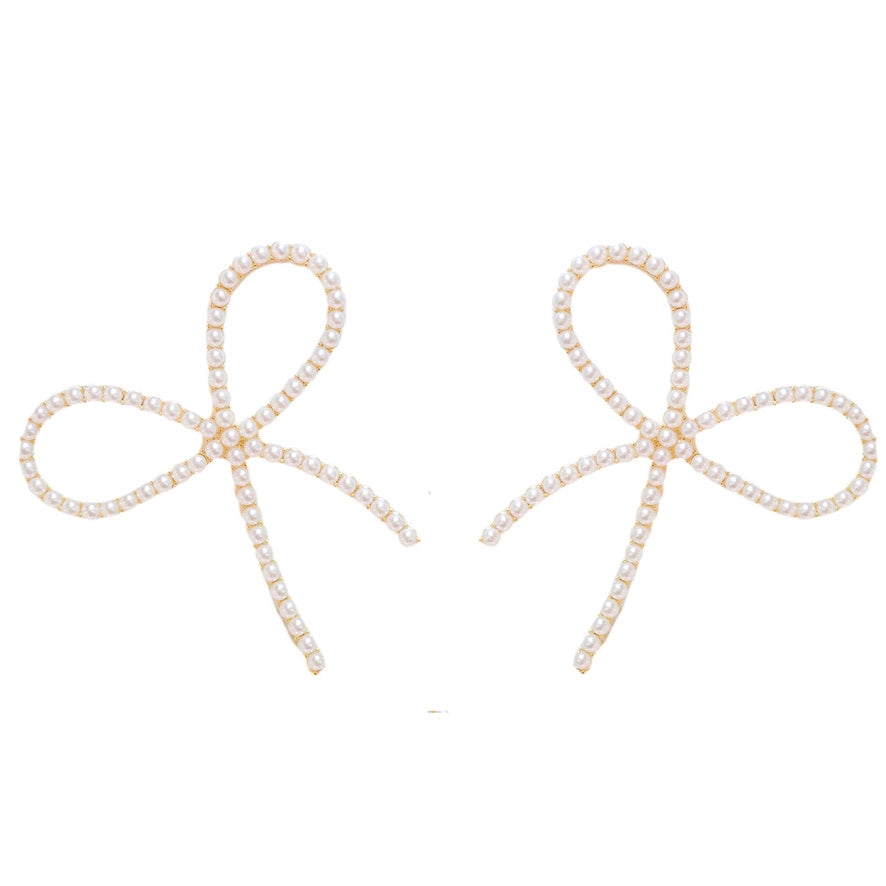 Pearl bow statement earring