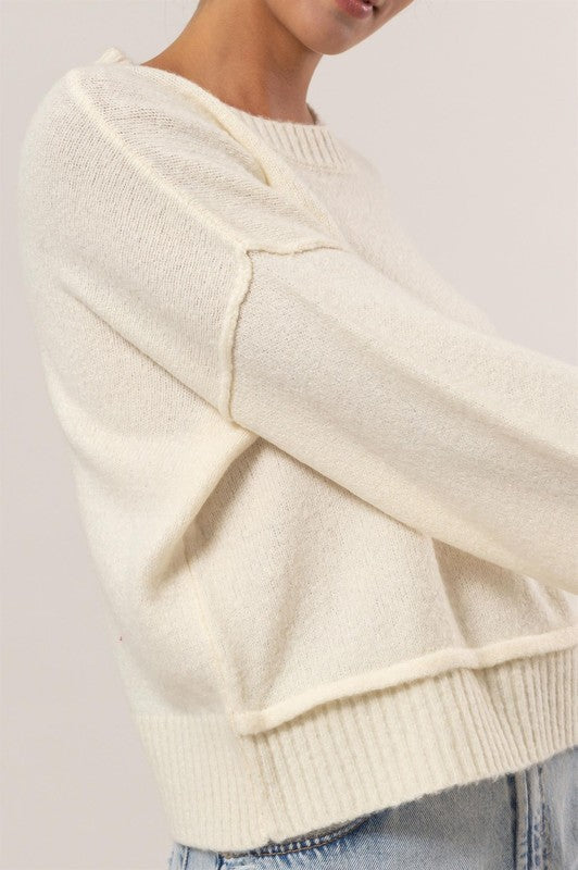 Cream oversized sleeve sweater