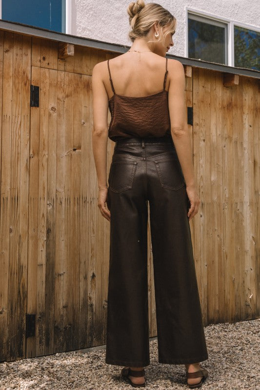 Distressed faux leather pants