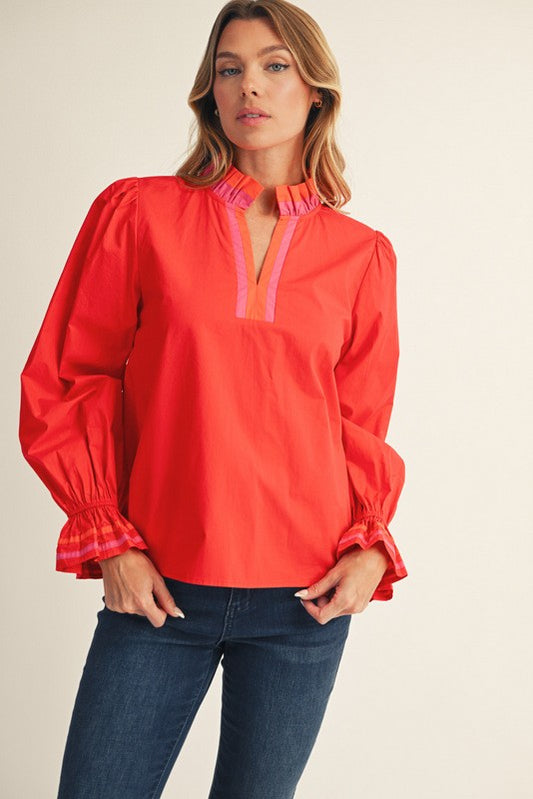 red collared ruffle hem top