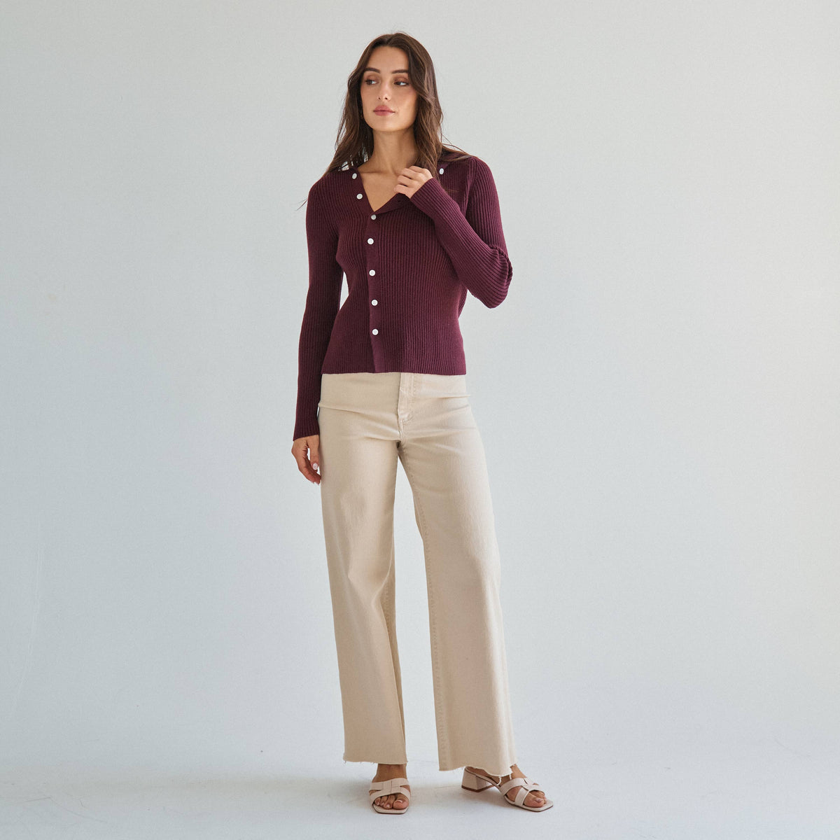 Asymmetrical button sweater