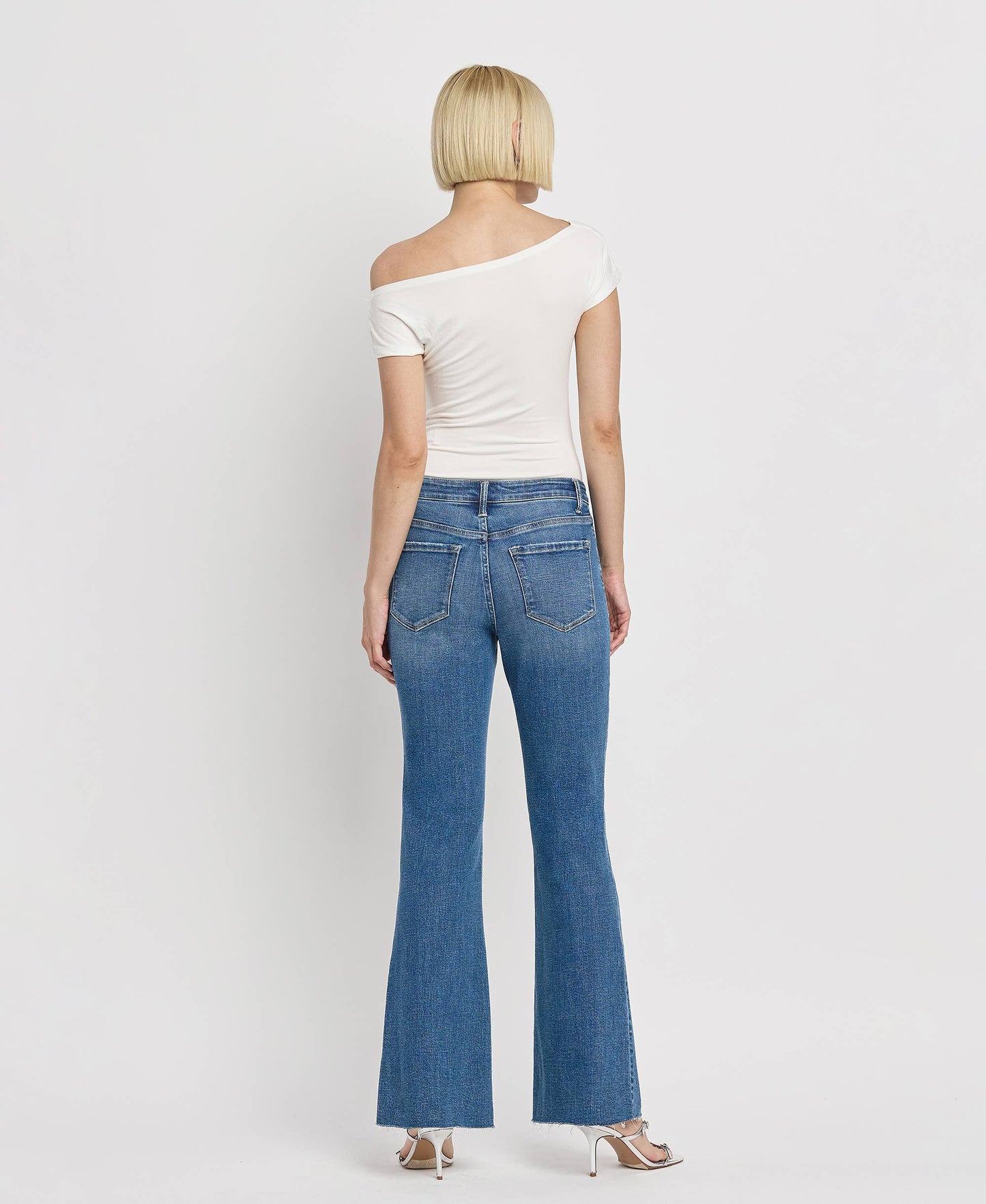 HIGH RISE RAW HEM RELAXED FLARE JEANS