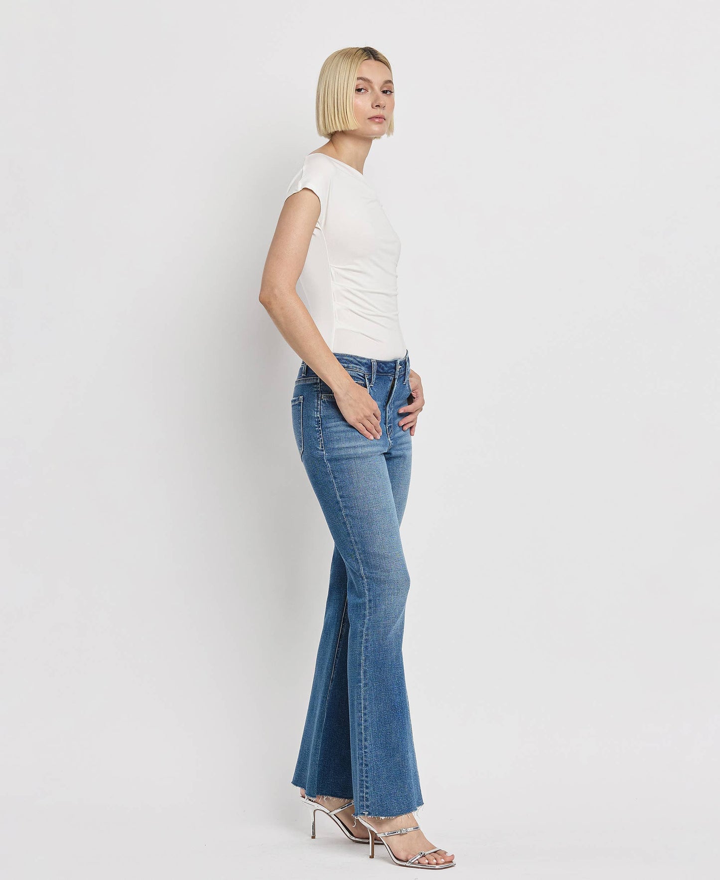 HIGH RISE RAW HEM RELAXED FLARE JEANS